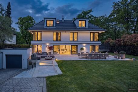Luxurious family residence with an elevator, underground parking, a fitness area, and a heat pump