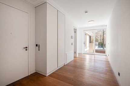Hallway with fitted wardrobes