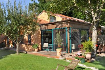 Mediterranean house with beautiful south garden in absolutely quiet idyllic location near the lake