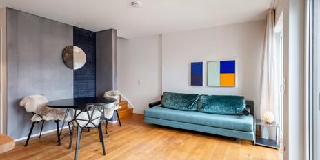Modern 4-room apartment with a balcony, spread over two levels
