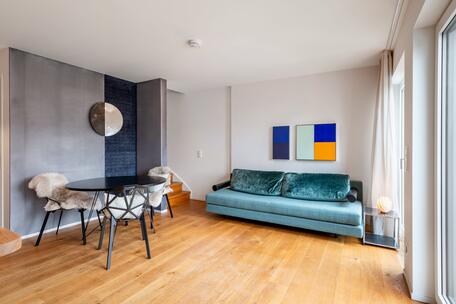 Modern 4-room apartment with a balcony, spread over two levels