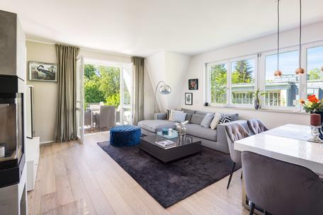 Modern elegance: 4-room apartment with west-facing loggia and sweeping views of the countryside