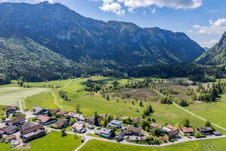 Modern villa in Chiemgau with alpine views, swimming pond and alpine hut