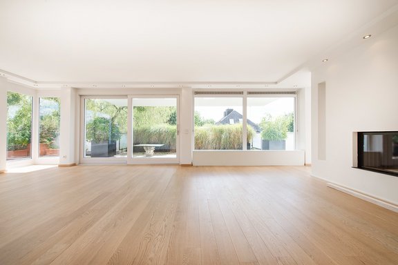 Light filled living area with fireplace