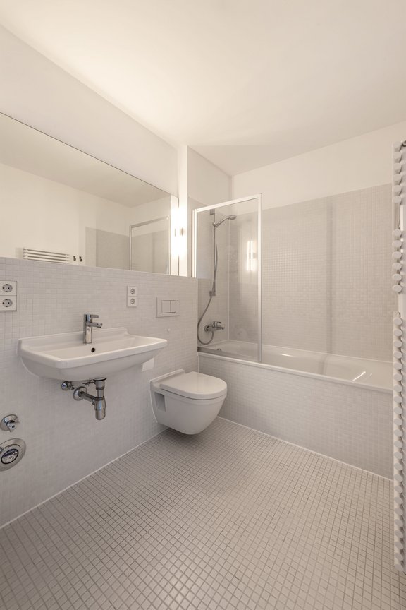 Puristically designed master bathroom