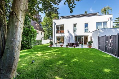 New house in house in light architecture with sunny southwest garden