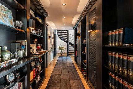 Library with bar installation