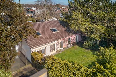 Peace & Privacy: A single-family home with a flexible floor plan and plenty of potential for renovation