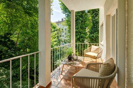 South balcony with a view of the greenery