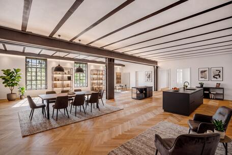 A spectacular, rare loft spanning approximately 222 m² with a historic “industrial vibe” in Haidhausen