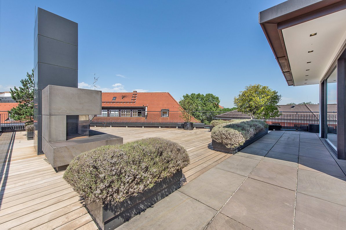 Unique roof terrace with outdoor fireplace