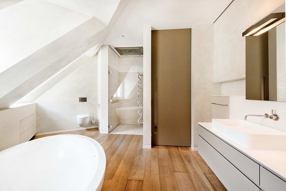 and floor-level walk-in shower with RainSky