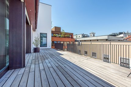 Large terrace in front of the cooking and dining area