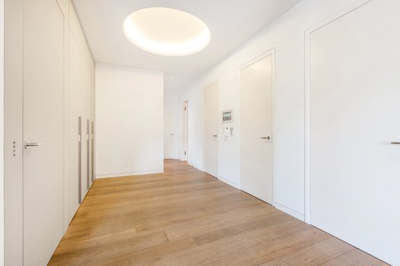 Cloakroom area with direct lift access