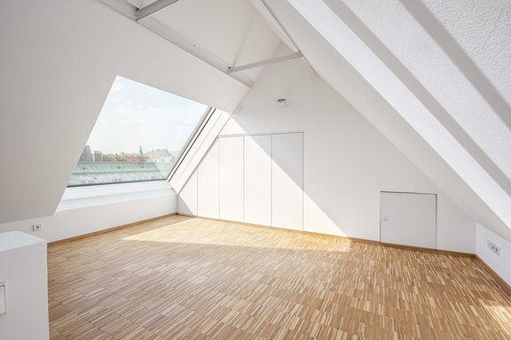 Attic studio with closet fixtures