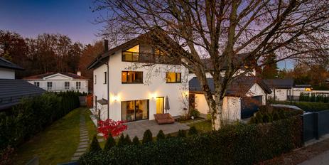 Modern single-family home with heat pump, four bedrooms, and sunny garden