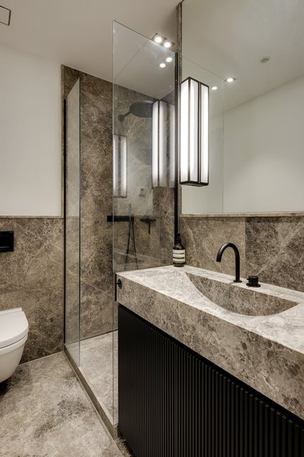 Fine natural stone guest bathroom
