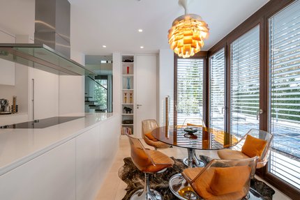 Elegant kitchen with glass bay window