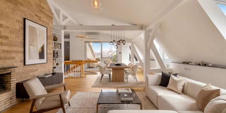 Charming duplex apartment with a rooftop terrace and garage in a historic building dating from 1896