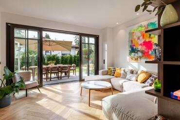 Half of a villa with luxurious amenities and a gorgeous garden in a prime location