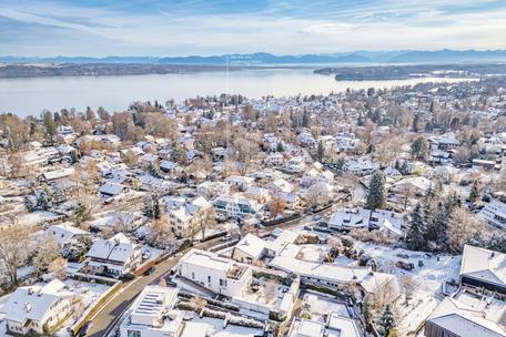 Living with a view: Stylish maisonette apartment with loggia, roof terraces, and dream view