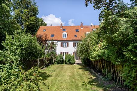 About the Renovation: A family-friendly townhouse facing southwest with an idyllic garden